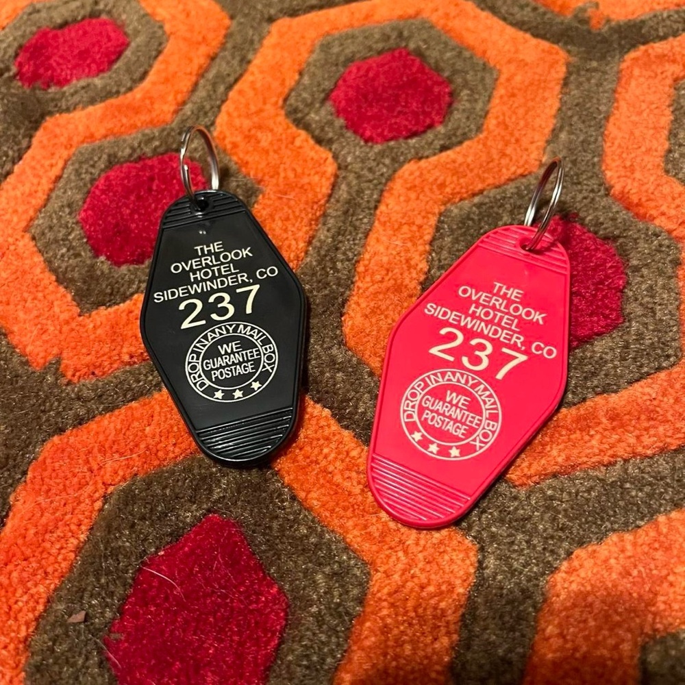 Black and gold Overlook Hotel Keychains based on the shining
